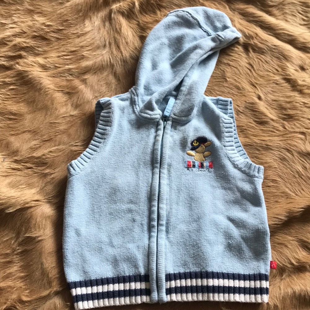 Adorable toddler sweater vest.